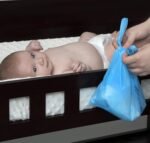 Nuby Diaper Disposal Bags for Baby - (6-Pack) 50 Count Disposable Bags - Fresh Baby Powder Scent - Blue - Image 3